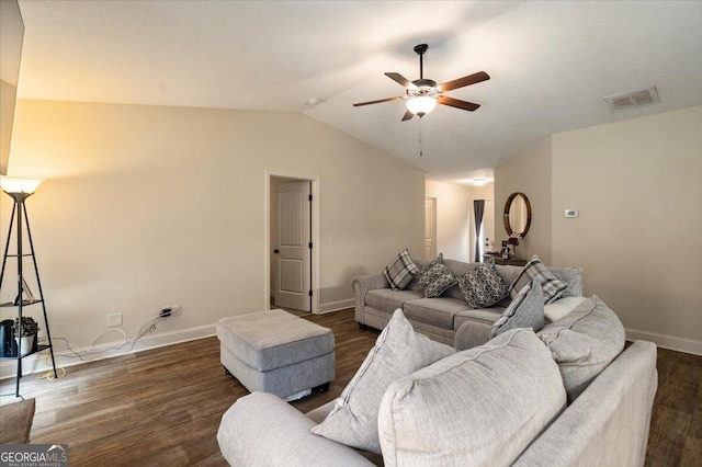 living room with ceiling fan, dark hardwood / wood-style flooring, and lofted ceiling