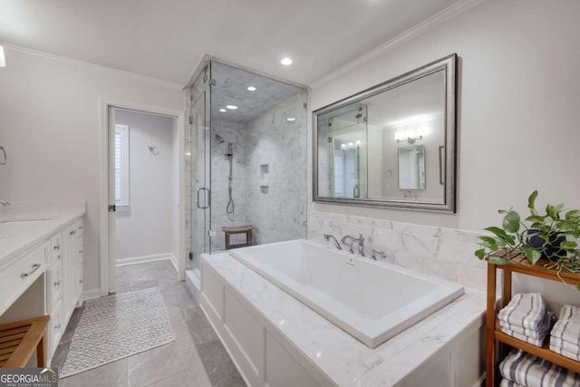 bathroom featuring tile patterned floors, vanity, crown molding, and independent shower and bath