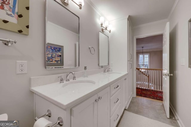 bathroom with vanity and crown molding