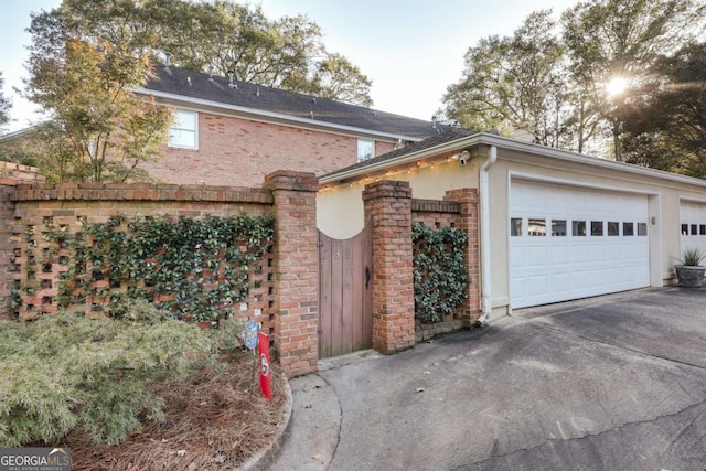 view of side of property featuring a garage