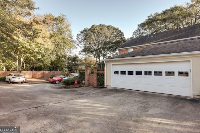 view of property exterior featuring a garage