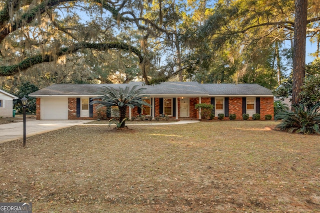 single story home featuring a garage