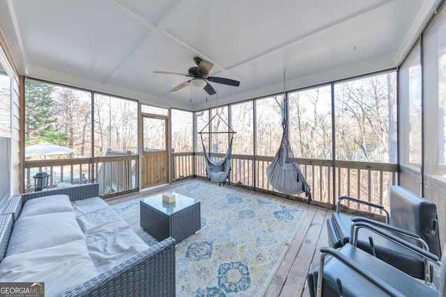 sunroom / solarium with ceiling fan and plenty of natural light