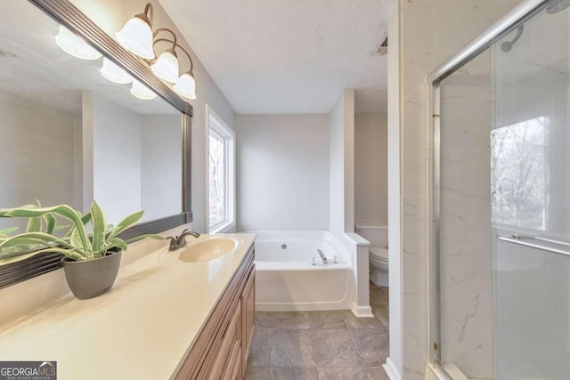 full bathroom with toilet, a textured ceiling, plus walk in shower, and vanity