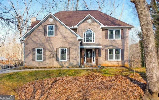 view of front facade with a front yard