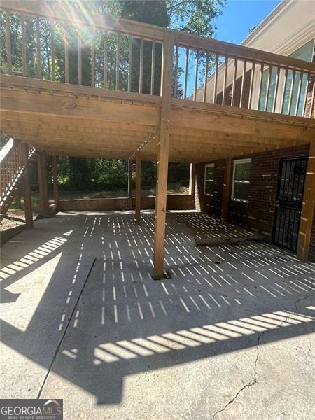 view of patio / terrace with a carport