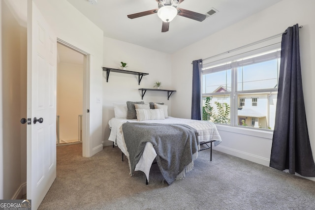 bedroom featuring ceiling fan and carpet floors