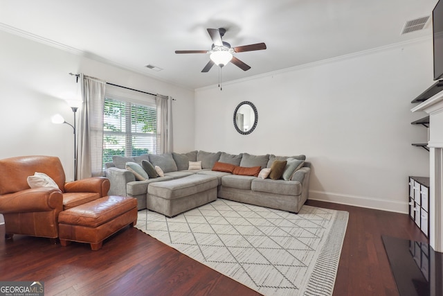 living room with light hardwood / wood-style flooring, ceiling fan, and ornamental molding