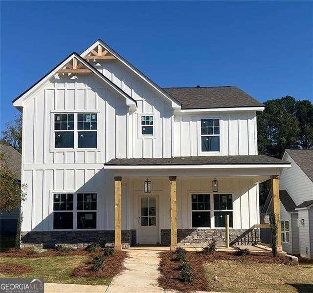 modern inspired farmhouse with a porch