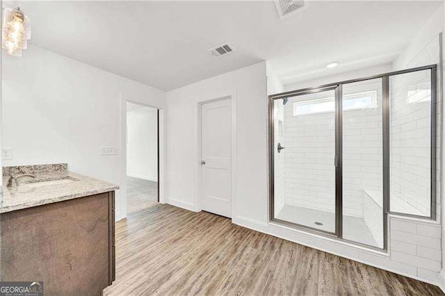 interior space featuring sink and light hardwood / wood-style flooring