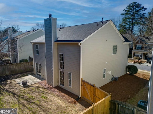 back of house featuring a patio area