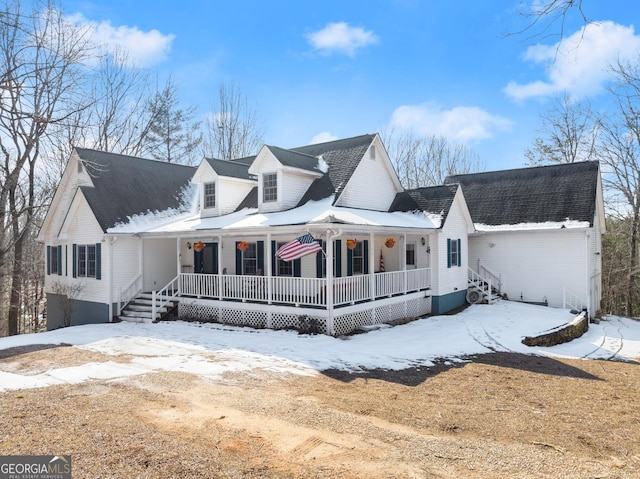 view of front of home with covered porch and a front yard