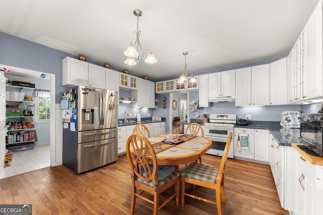 2314 Panorama Dr, Sautee Nacoochee, GA 30571 - living room with a fireplace, hardwood / wood-style flooring, and high vaulted ceiling