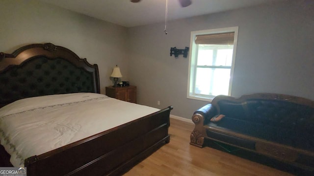 bedroom featuring ceiling fan and light wood-type flooring