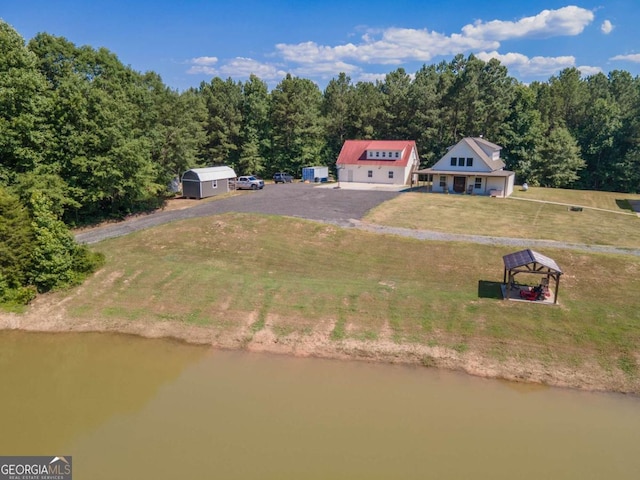 drone / aerial view with a water view