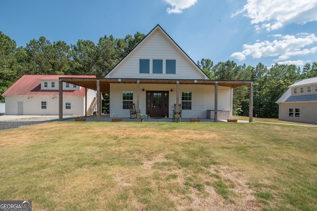 view of front of property with a front yard and a porch