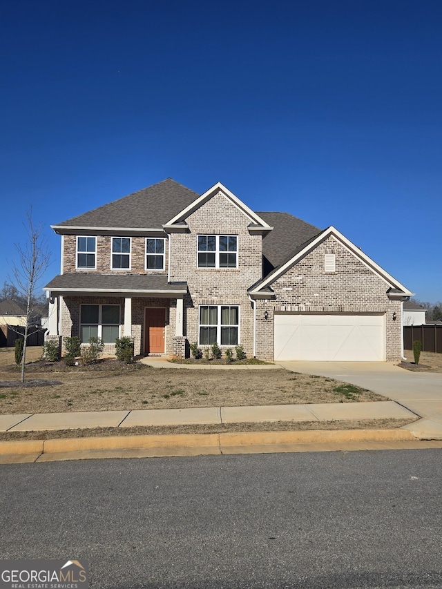 view of front of home with a garage