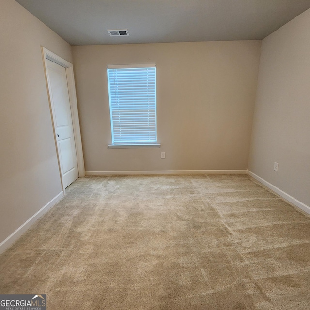 view of carpeted spare room