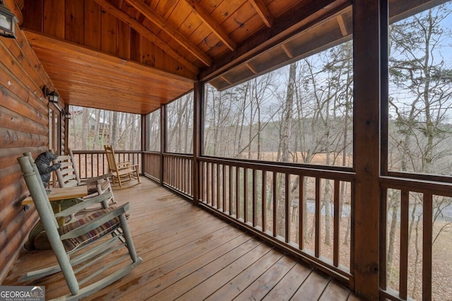 wooden terrace featuring a porch