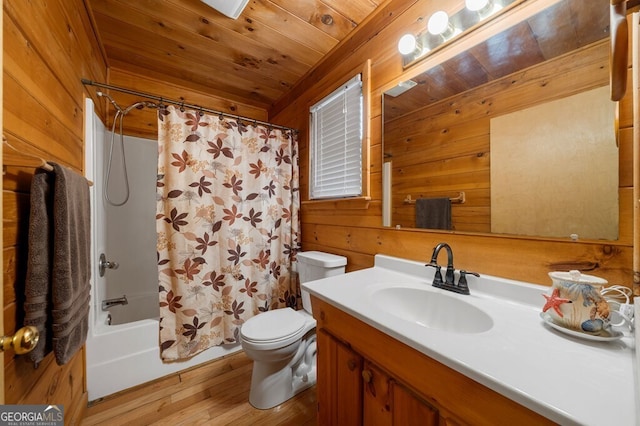 full bathroom featuring vanity, wood walls, hardwood / wood-style flooring, toilet, and wood ceiling