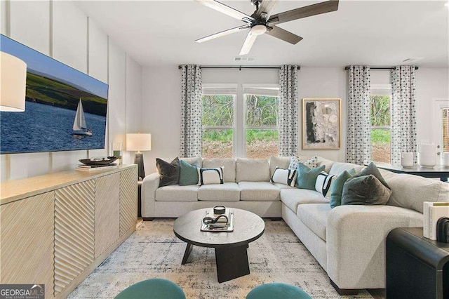 living room featuring ceiling fan