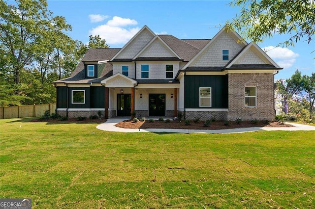 craftsman house featuring a front yard