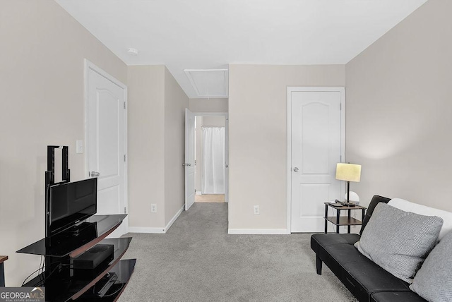 living area with light colored carpet