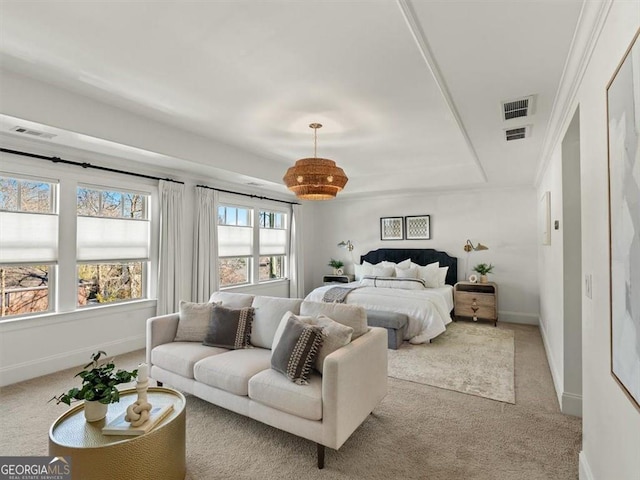 bedroom with crown molding and light carpet