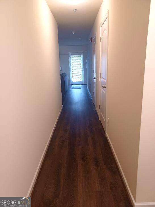 hall featuring dark hardwood / wood-style floors