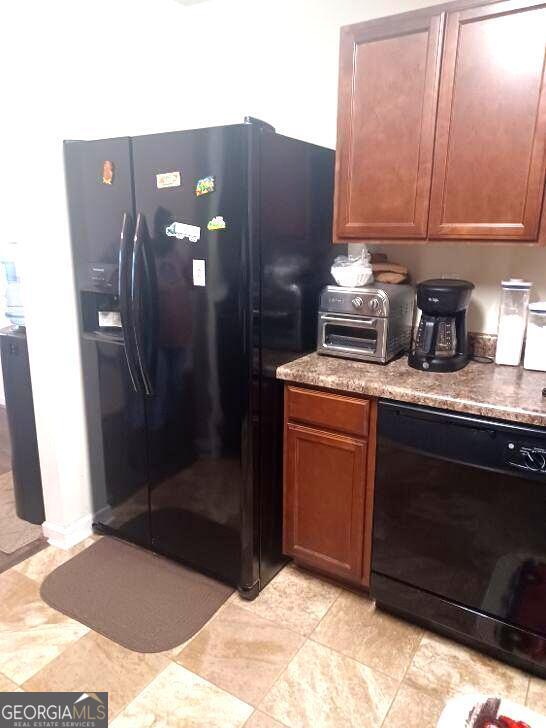 kitchen with black appliances