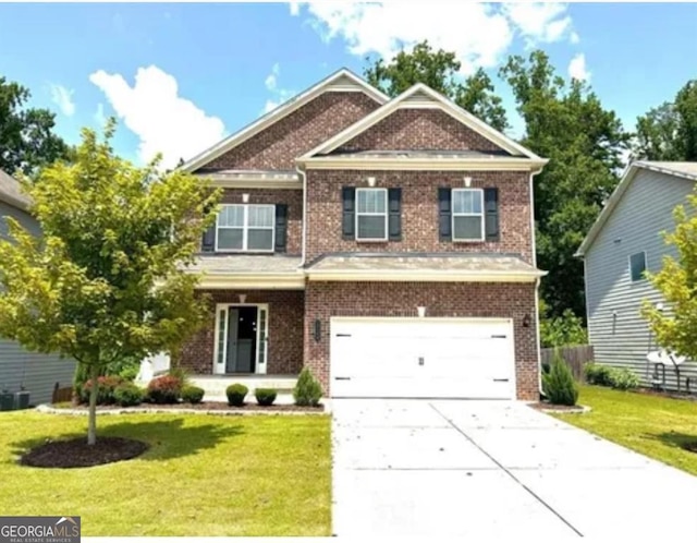 craftsman-style house with a garage and a front yard