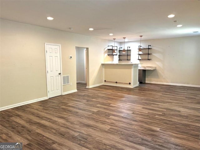 interior space with dark hardwood / wood-style floors