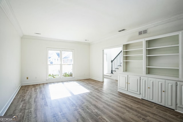 unfurnished living room with dark wood-type flooring and crown molding