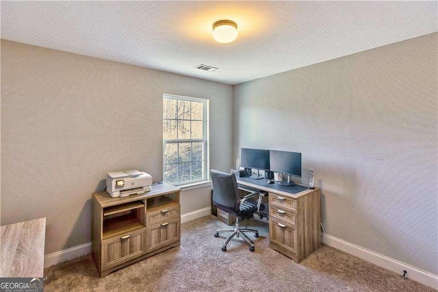 view of carpeted office space