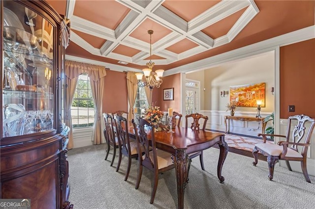 dining room featuring a notable chandelier, beamed ceiling, coffered ceiling, and ornamental molding