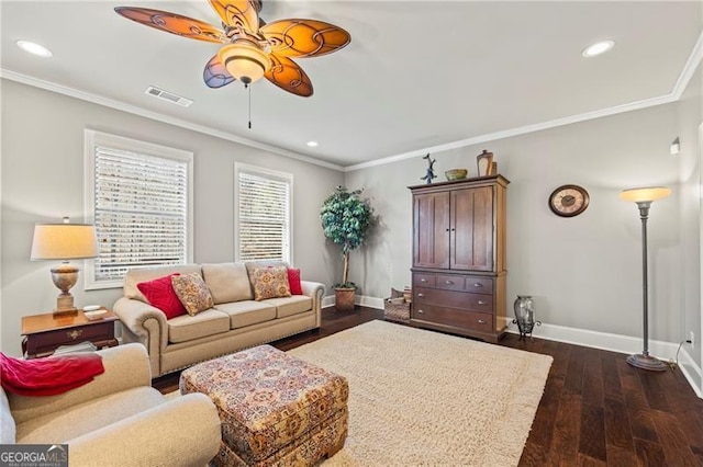 living room with ceiling fan, dark hardwood / wood-style flooring, and ornamental molding