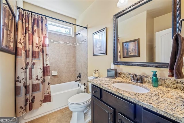 full bathroom with tile patterned flooring, vanity, toilet, and shower / bath combo with shower curtain