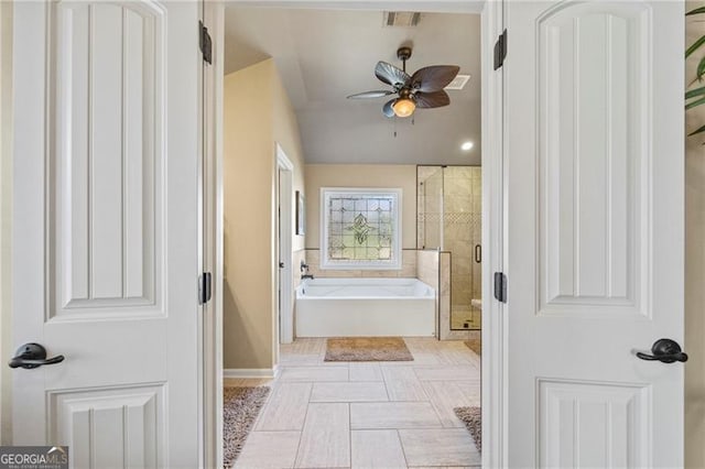 bathroom featuring tile patterned floors, ceiling fan, and shower with separate bathtub