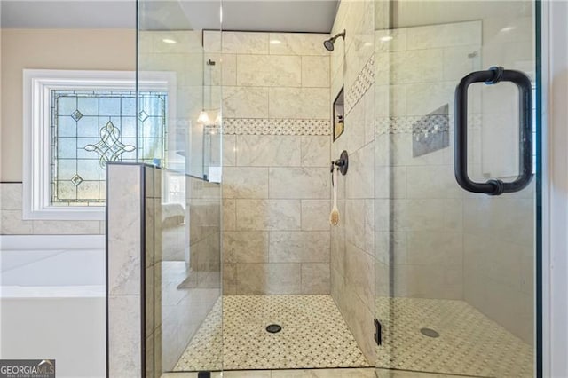 bathroom with independent shower and bath