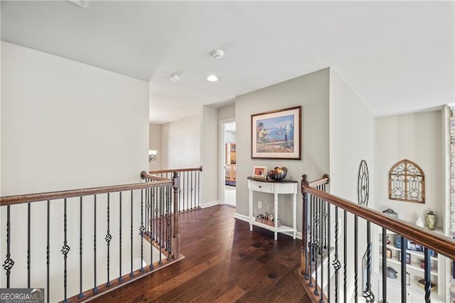 hallway featuring dark hardwood / wood-style floors