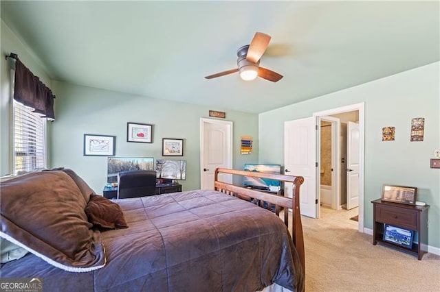 bedroom with ceiling fan and light colored carpet