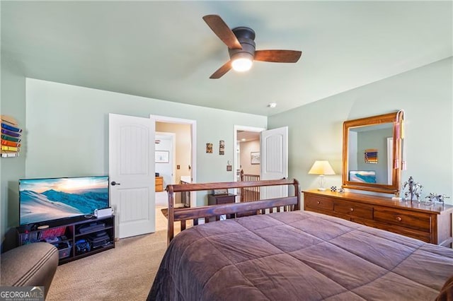 carpeted bedroom with ceiling fan