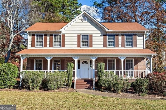 view of front facade with a front yard