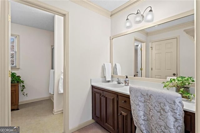 bathroom featuring vanity and ornamental molding