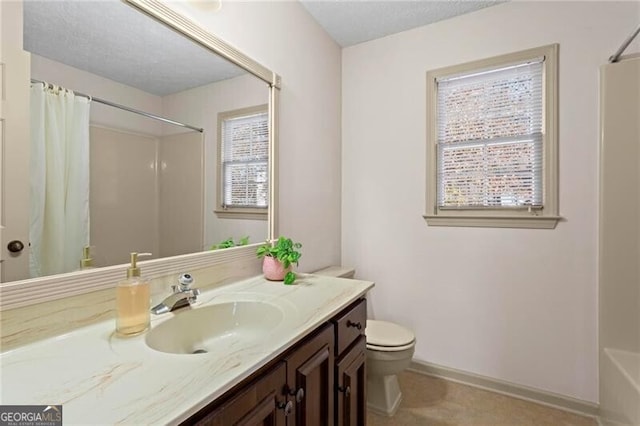 full bathroom with plenty of natural light, vanity, shower / tub combo, and toilet