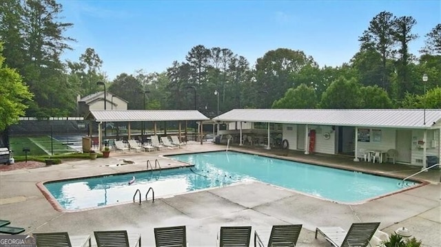 view of pool featuring a patio