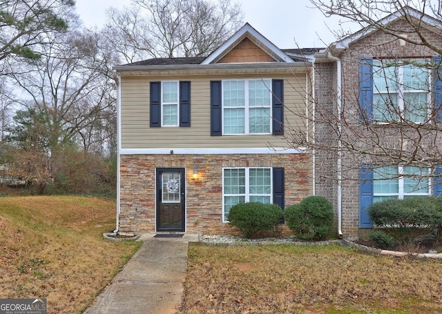 view of front of home with a front yard