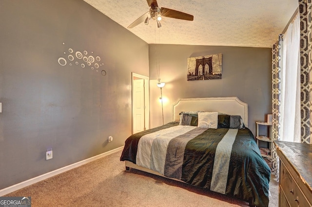 bedroom with carpet flooring, ceiling fan, lofted ceiling, and a textured ceiling