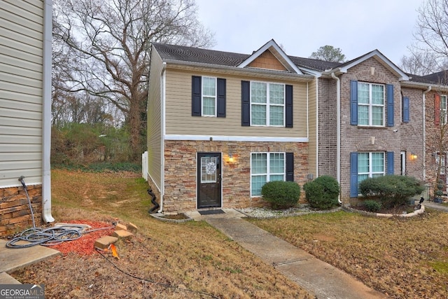 view of front of home with a front yard