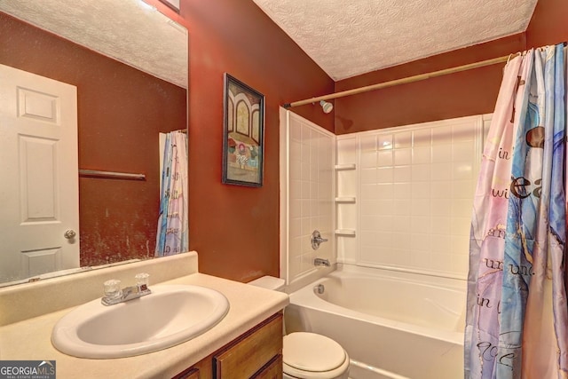 full bathroom with vanity, shower / bath combo, a textured ceiling, and toilet